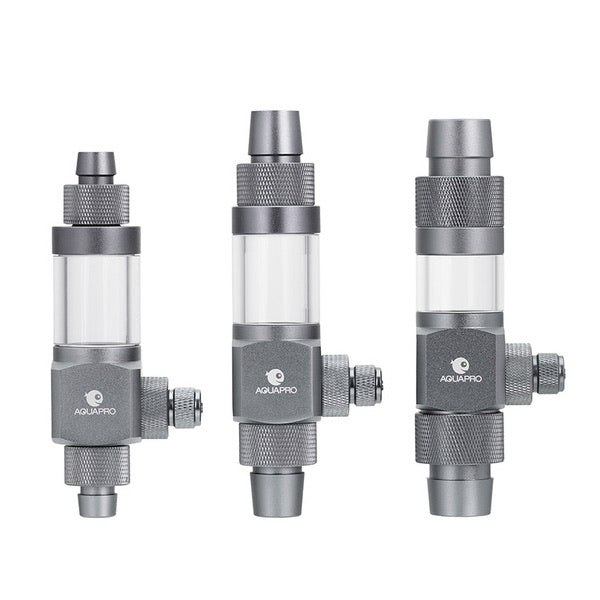 Three gray and clear inline diffusers. Valve components on a white background