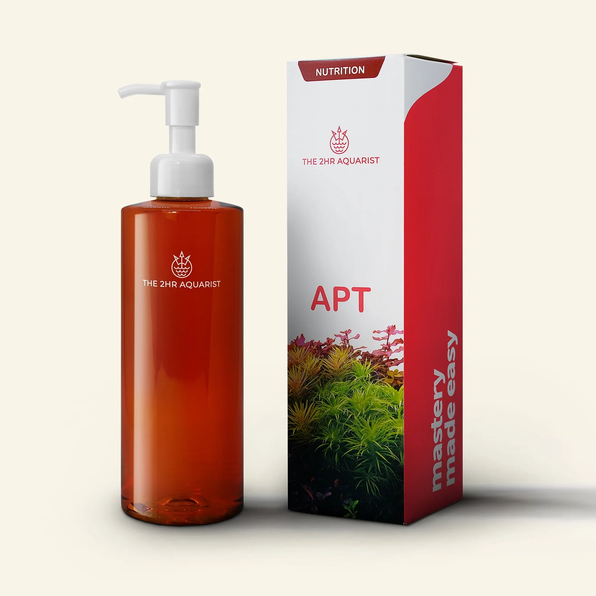 A red bottle with a white pump labeled '2Hr Aquarist APTe' aquatic plant fertiliser next to a white and red box 