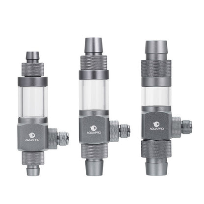 Three gray and clear inline diffusers. Valve components on a white background