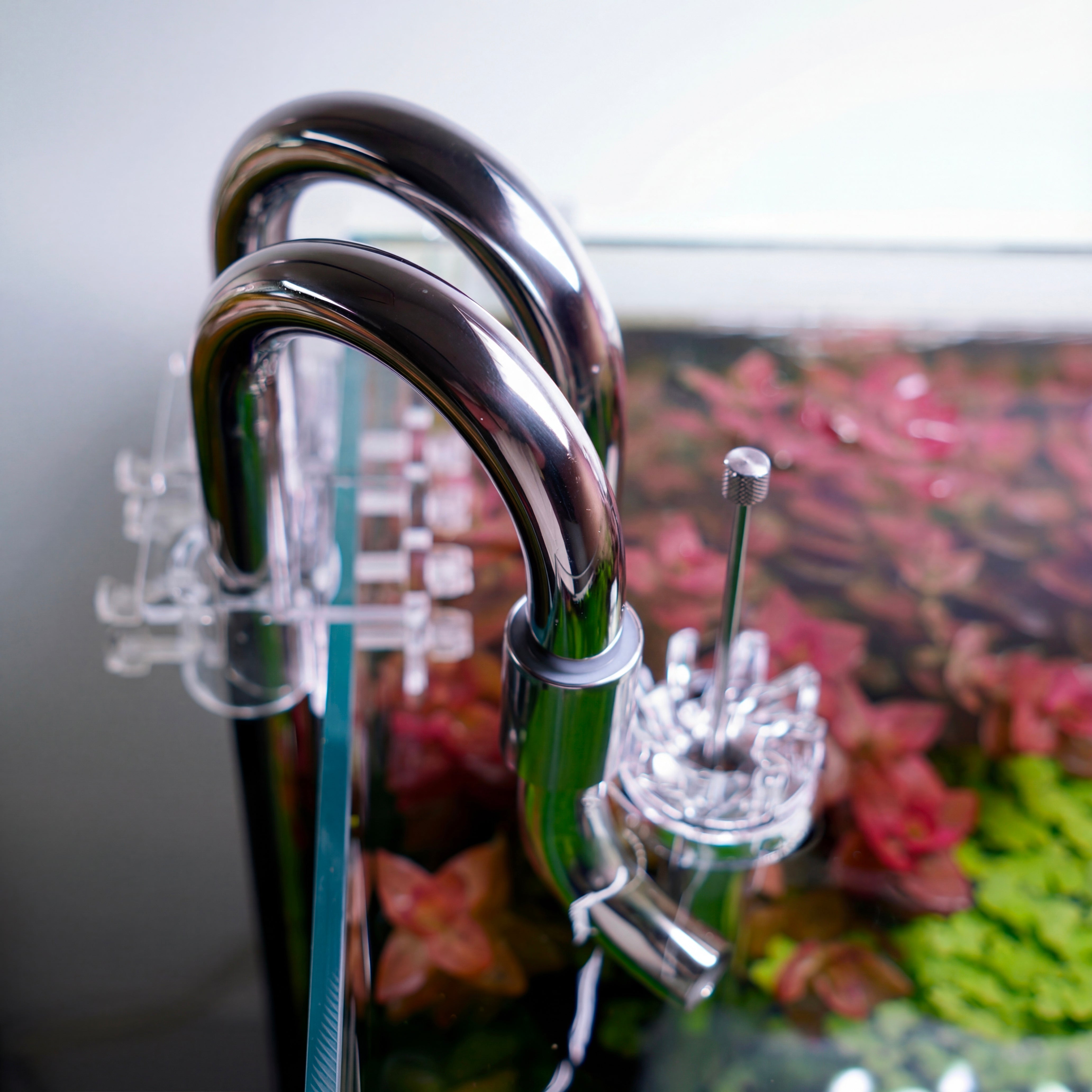 stainless steel lily pipe attached to aquarium