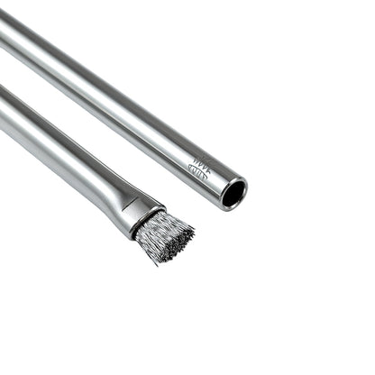 metal brushes with bristle heads on a light gray background