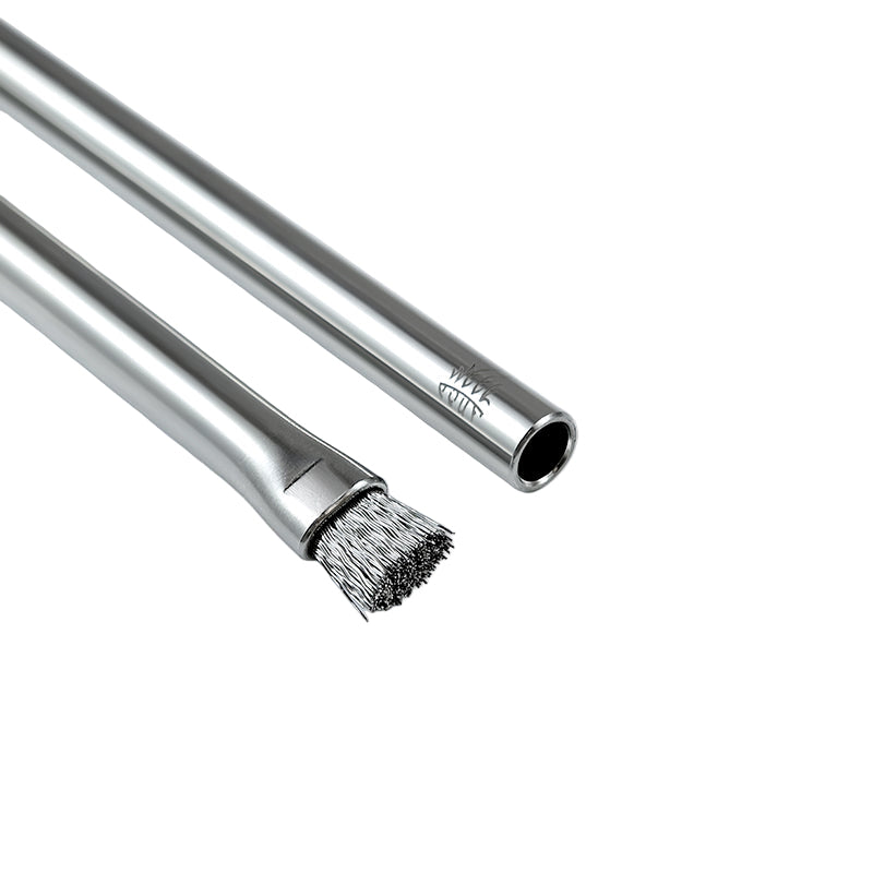 metal brushes with bristle heads on a light gray background